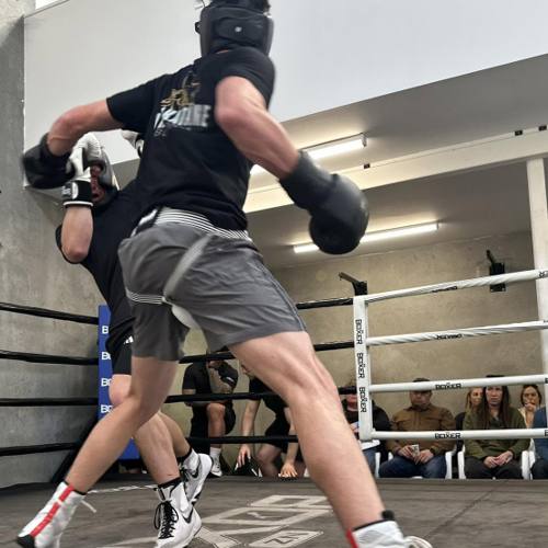 Two boxers sparring in the ring at Whakatāne Boxing
